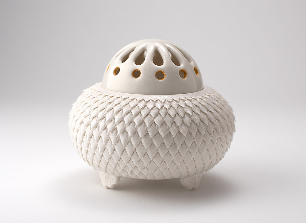 «Coupure d'argile», brûleur d'encens